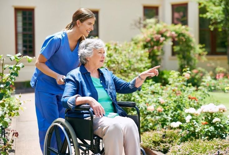 disability support assists aged care women with walker