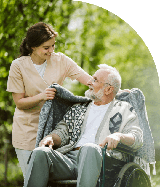Carer providing safe transport assistance for an elderly woman with a wheelchair, ensuring easy access to appointments.