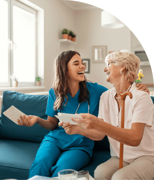 http://Home%20care%20support%20worker%20shares%20a%20joyful%20moment%20with%20elderly%20clients