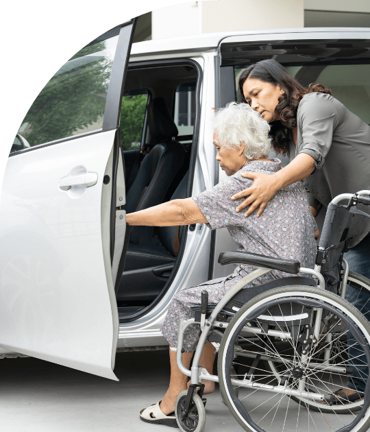 Carers provide warm outdoor support and transport assistance for clients with mobility needs in Fortitude Valley